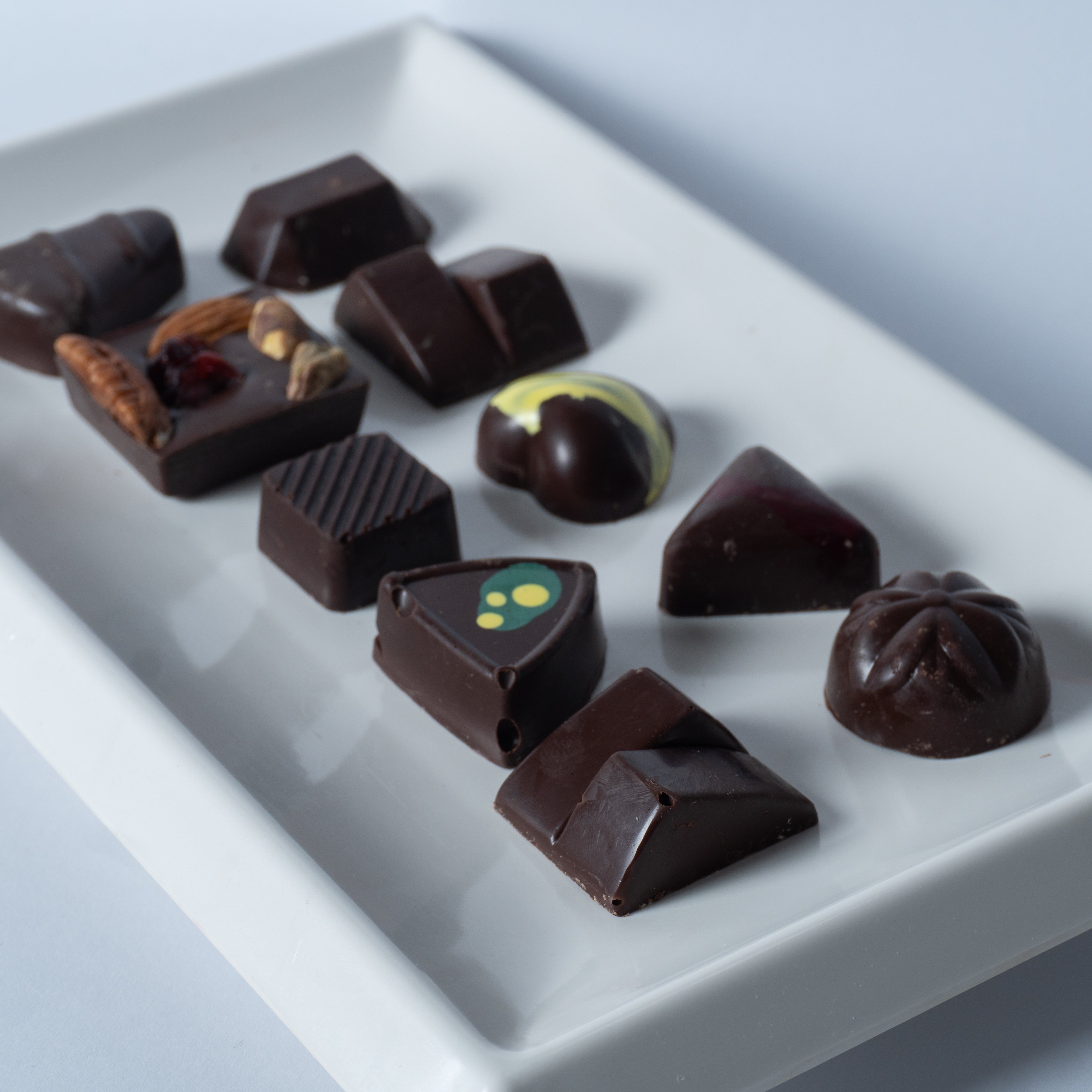 Paquete de 30, 50 ó 70 Carteritas de 9 chocolates
