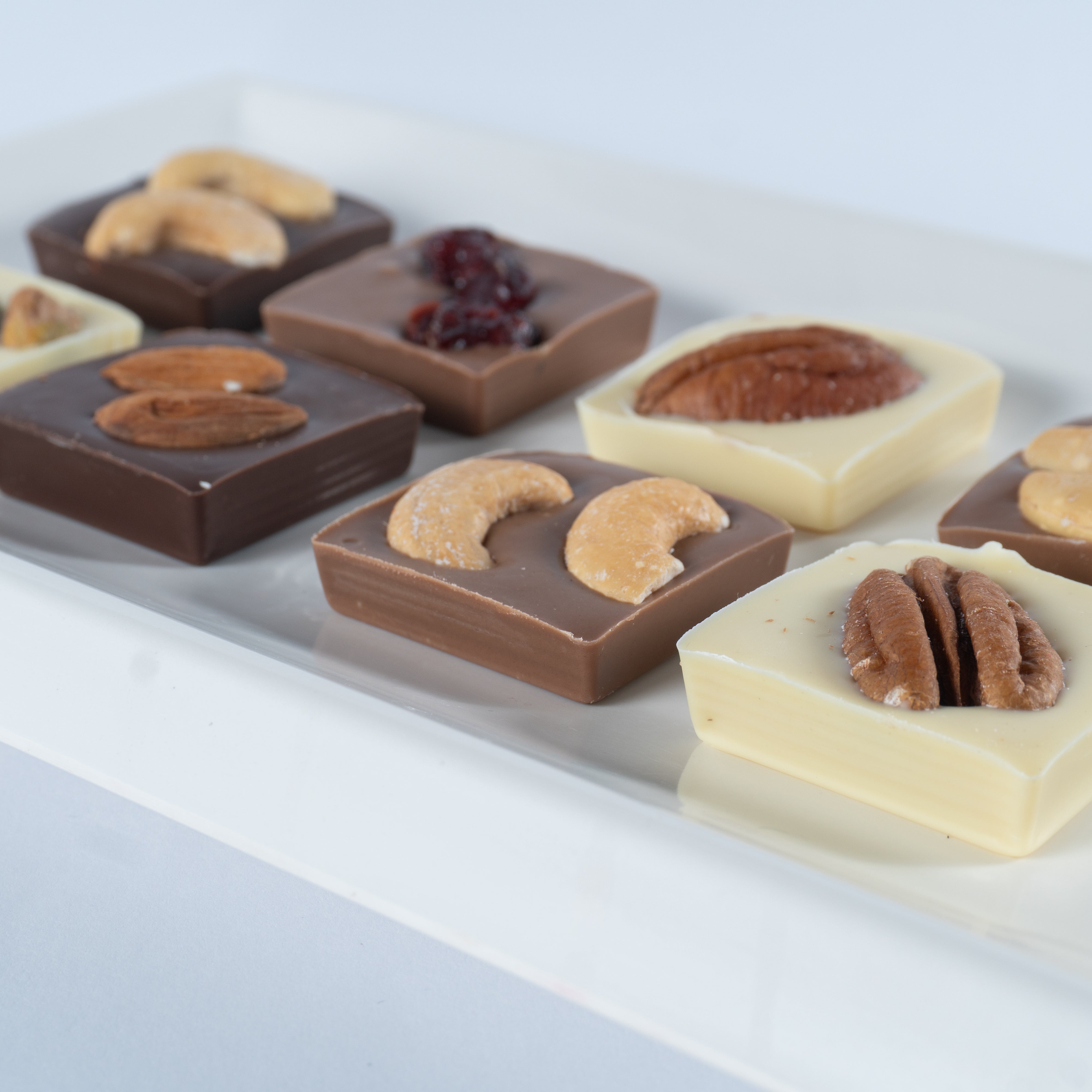 Paquete de 30, 50 ó 70 Carteritas de 9 Cuadrets de chocolate