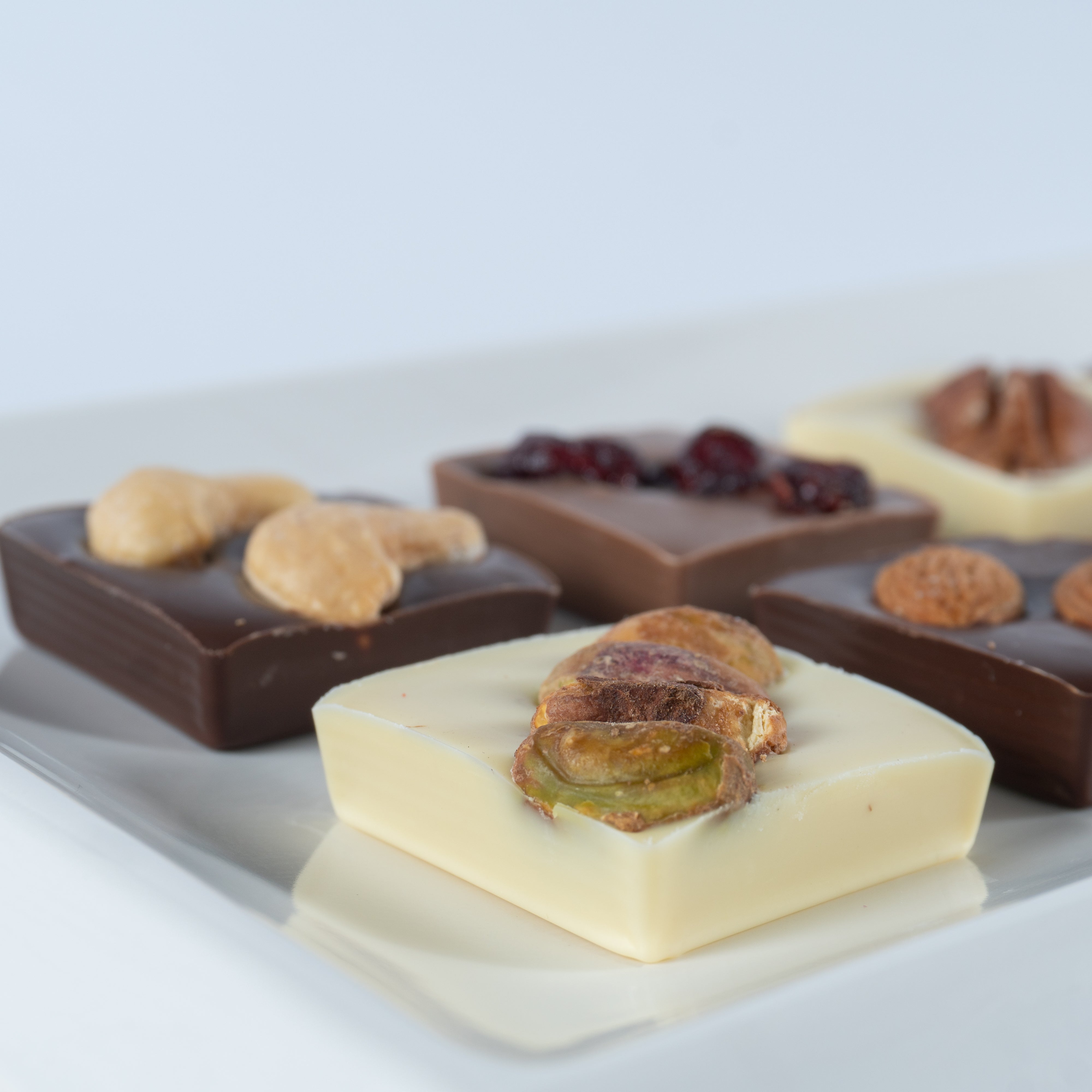 Paquete de 30, 50 ó 70 Carteritas de 9 Cuadrets de chocolate